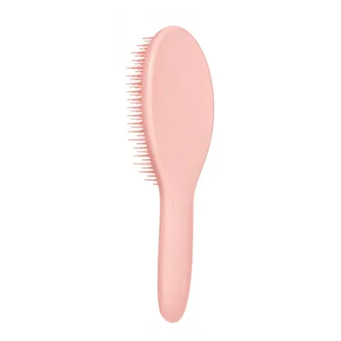Obtenez des cheveux volumineux et brillants avec Tangle Teez